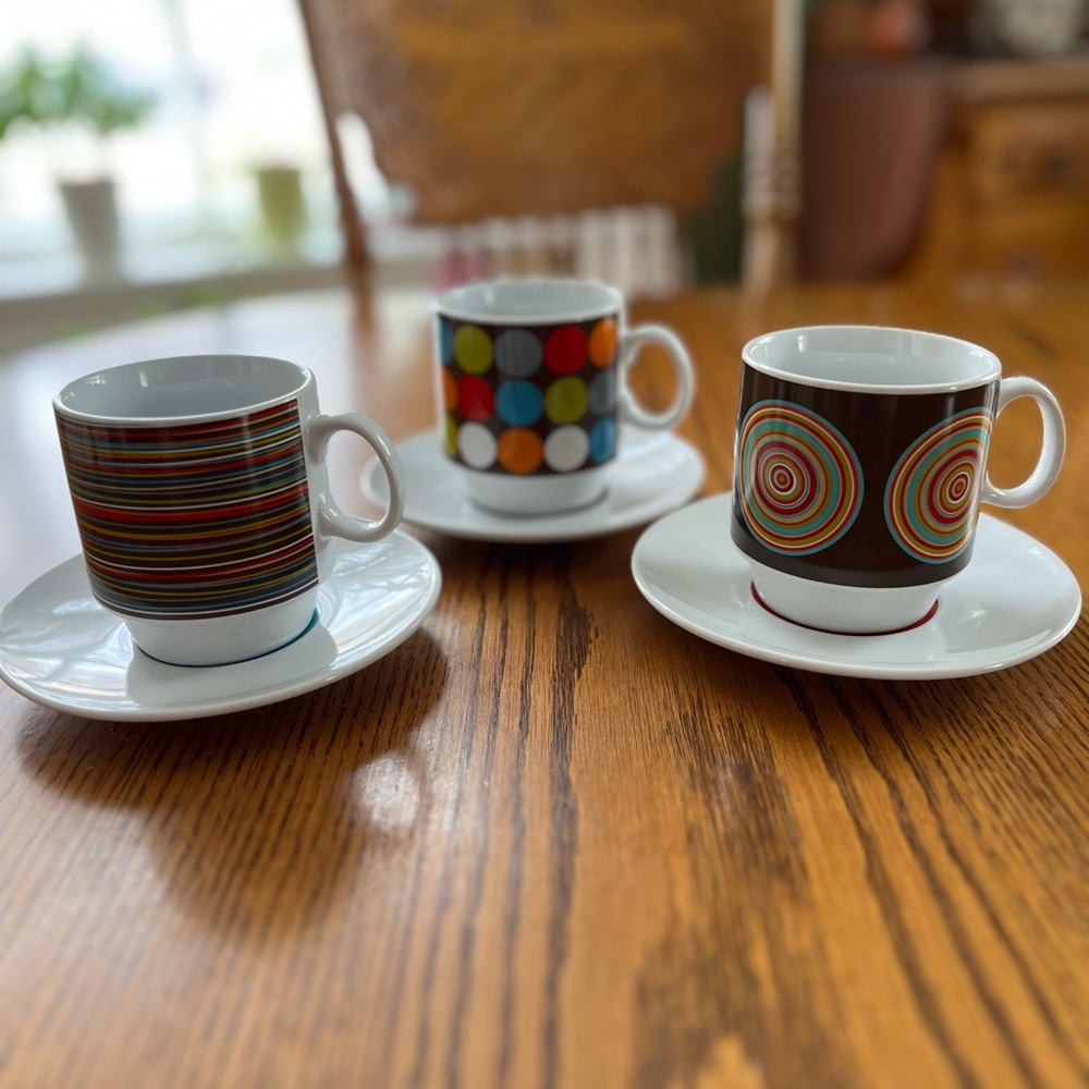 Bundle of Colorful Caribou Coffee Mugs with Saucers
